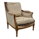 Fauteuil bergère à dossier canné
