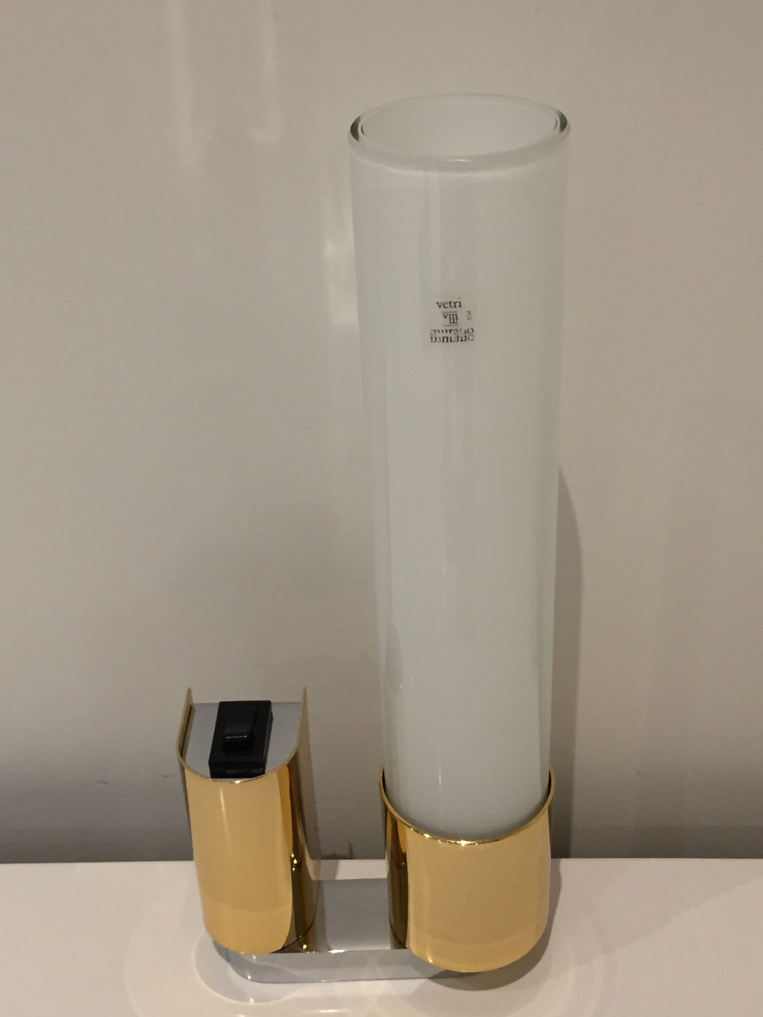 Pair of egoluce vintage orientable wall light in brass and Murano glass, Italy