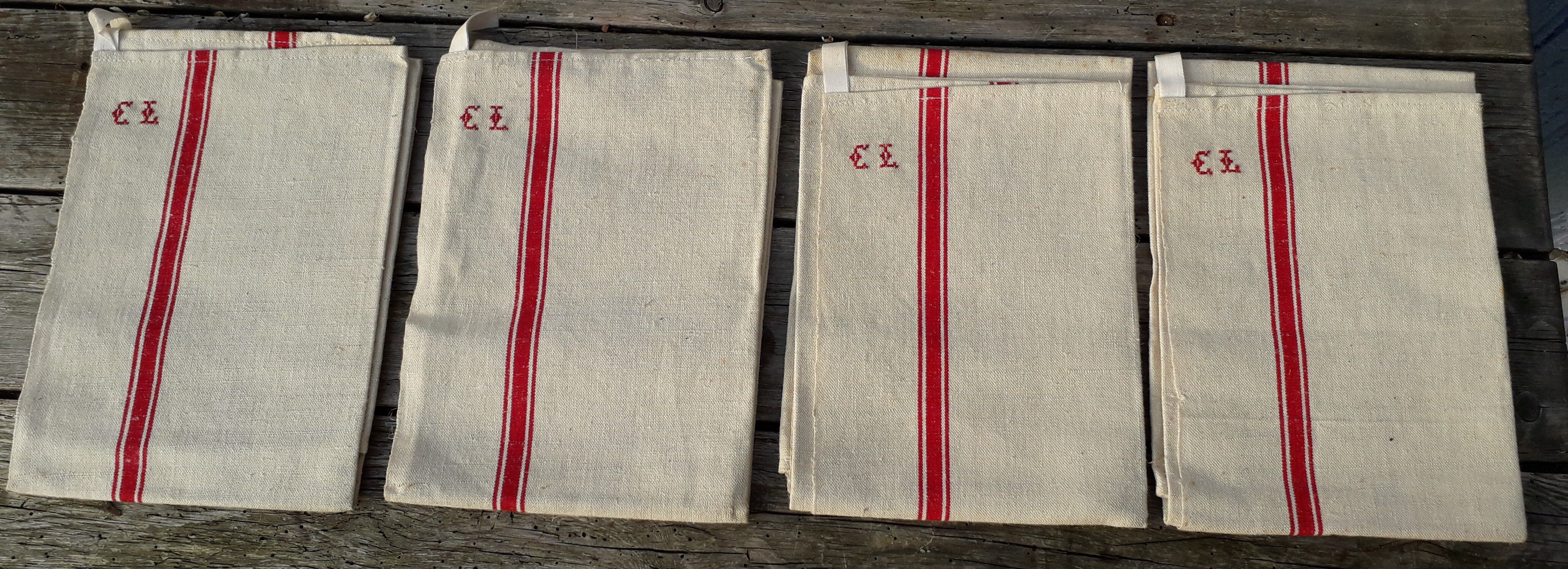 Set of 4 old embroidered tea towels in linen