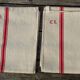 Set of 4 old embroidered tea towels in linen