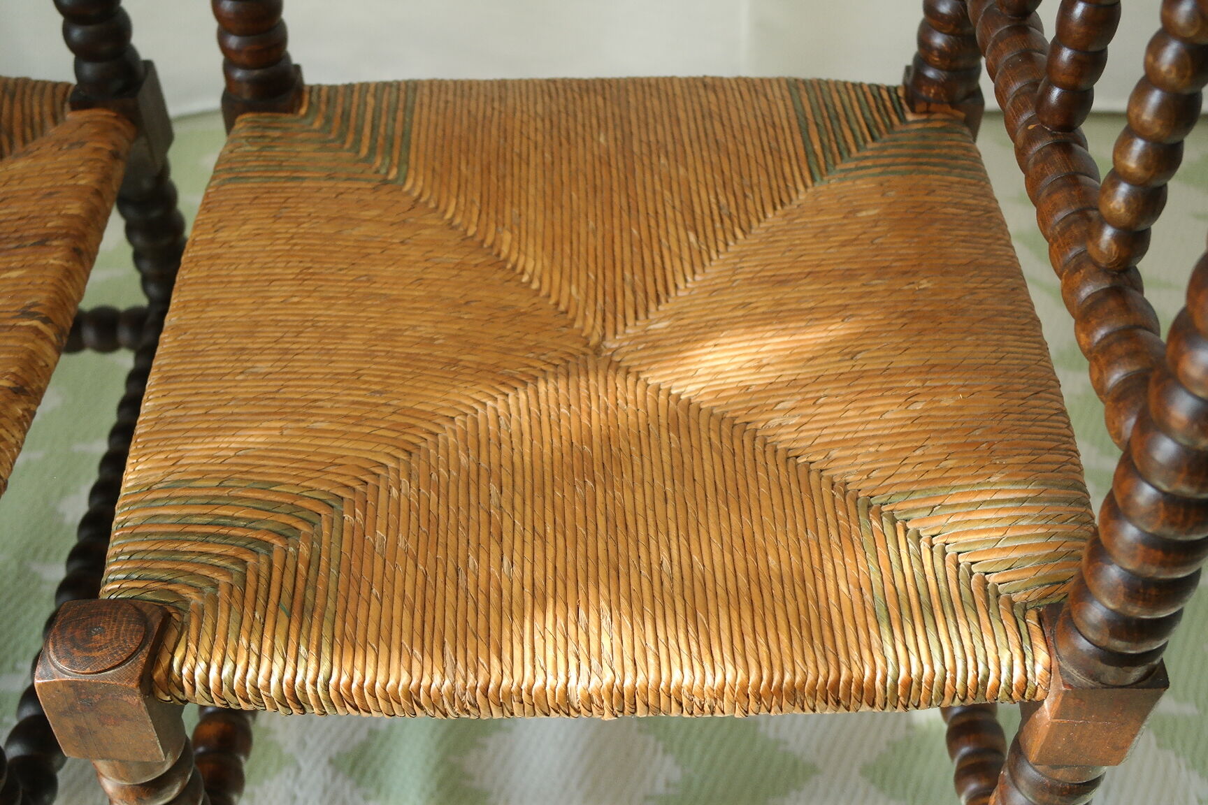 Pair of chairs corner fireplace turned beaded wood