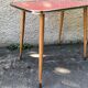 Table bass feet compass formica red