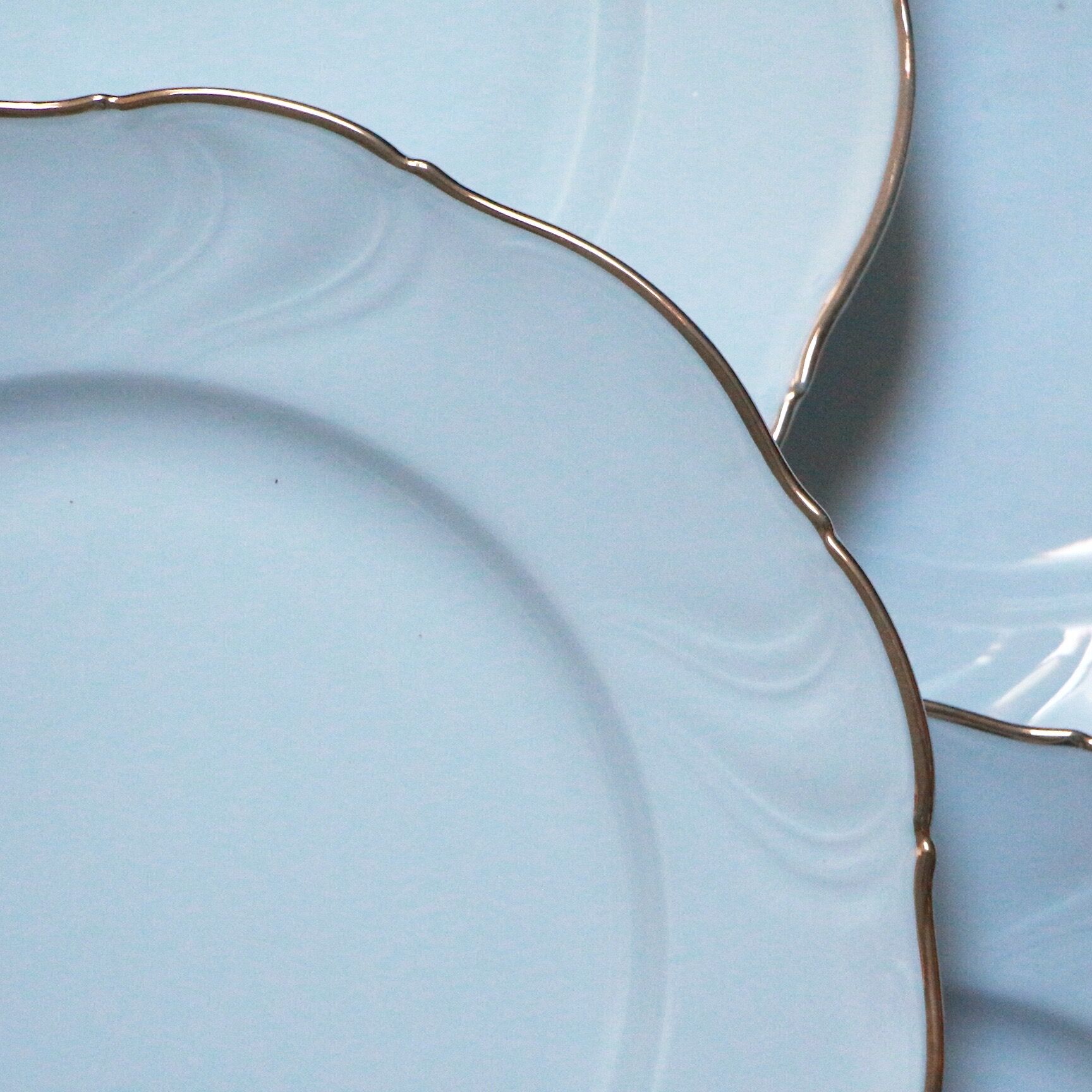 White and gold porcelain plates