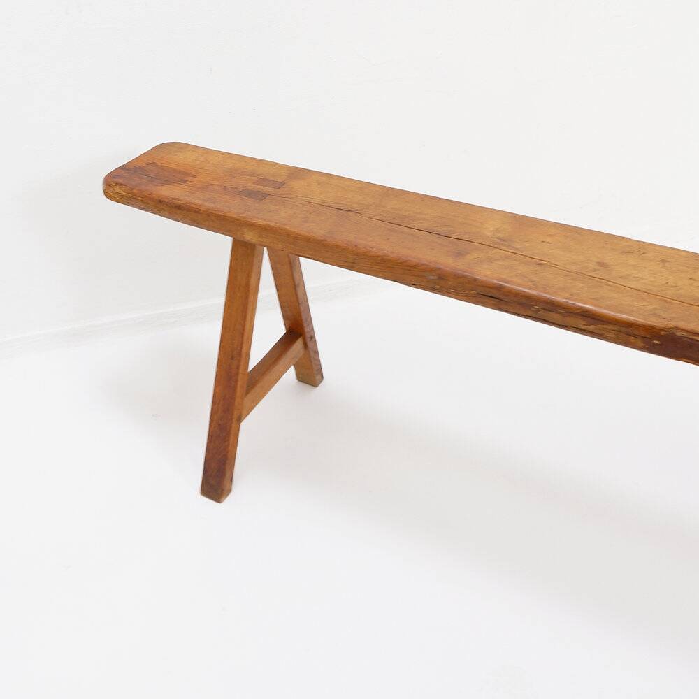 Banc rustique en bois massif de ferme avec pieds tréteaux - 1960s