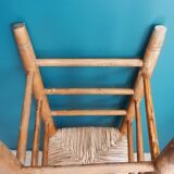 Children's high chair made of wood and straw