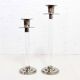 Pair of lucite and silver-plated metal candlesticks