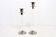 Pair of lucite and silver-plated metal candlesticks