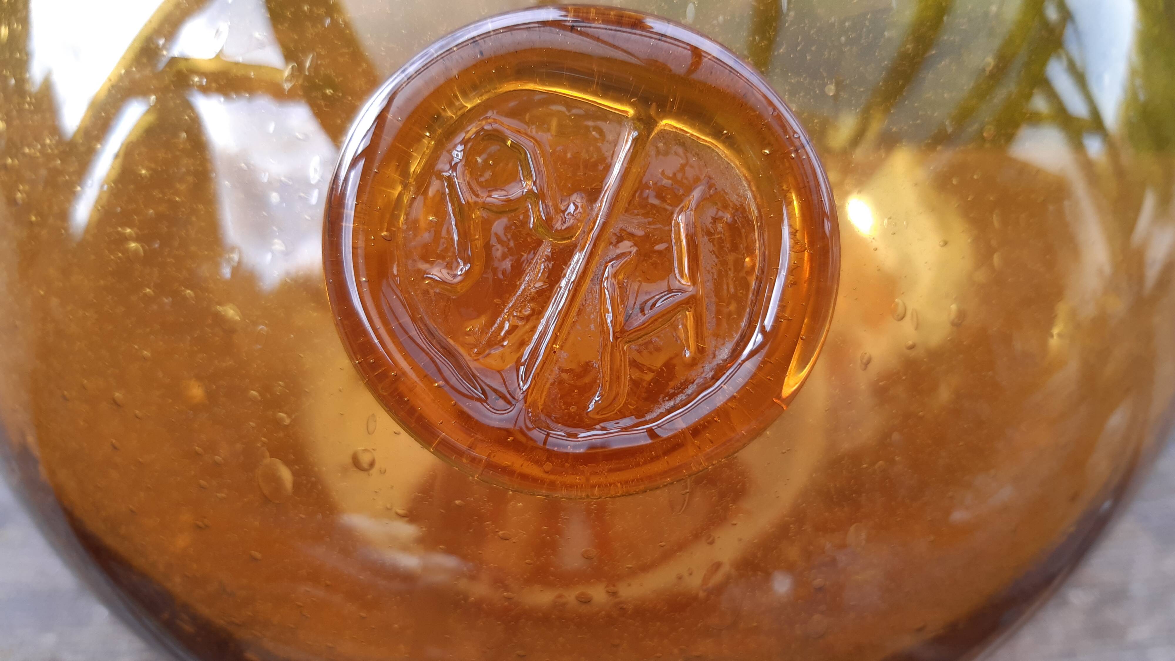 Demijhon or amber blown glass