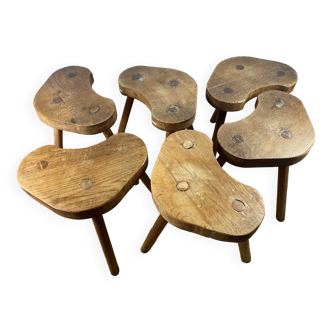 Set of 6 brutalist solid oak tripod farm stools from the 1950s