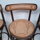 4 curved wood and cane bar stools