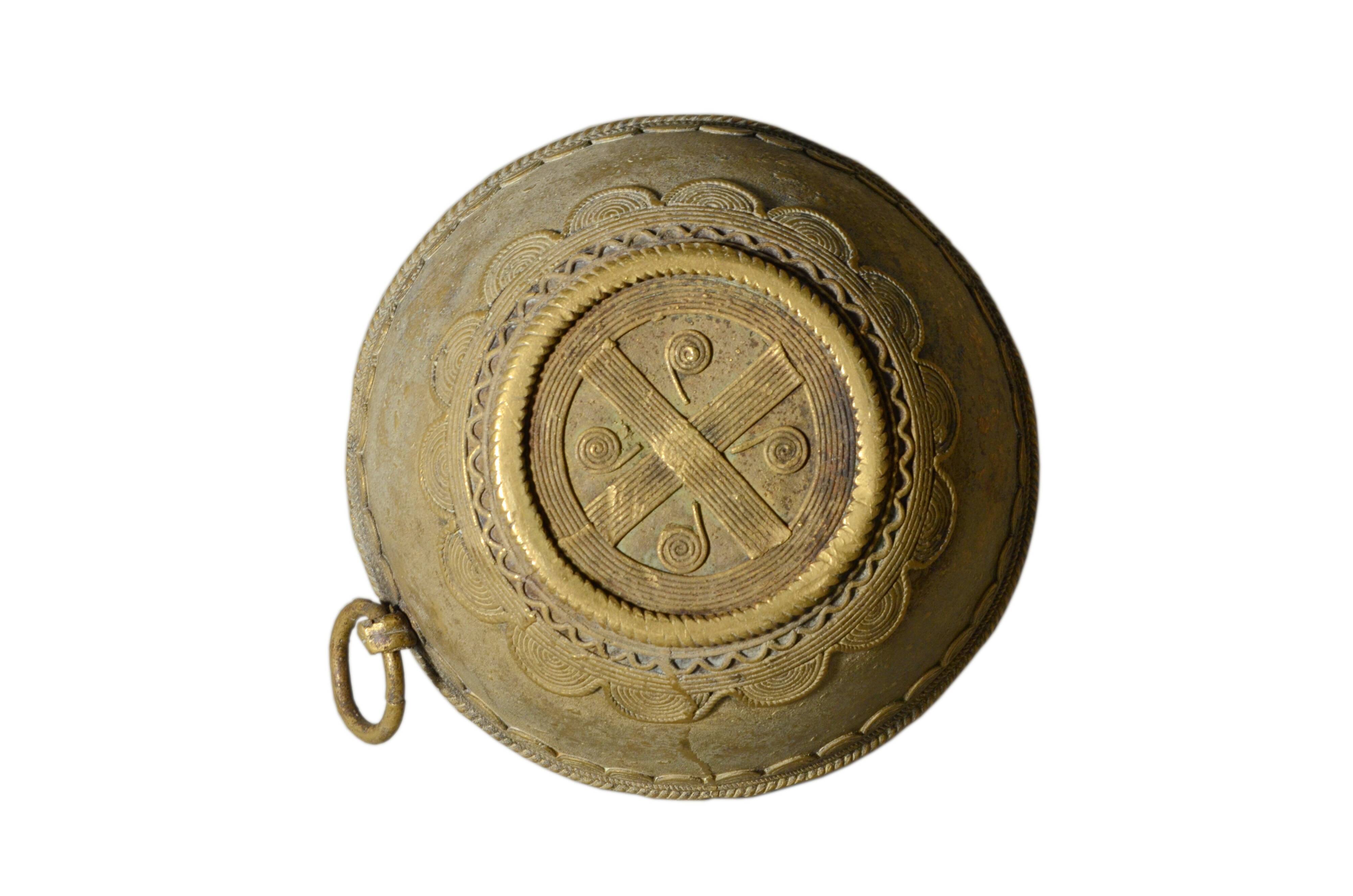 Ancient bronze ethnic pot, handcrafted in India.