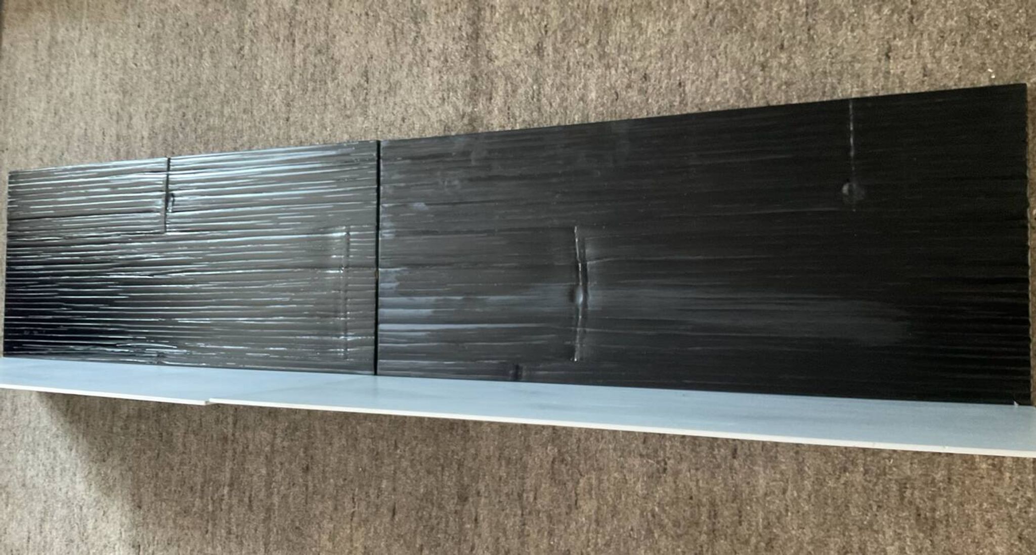 Pair of contemporary shelves in steel and stained wood
