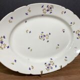 Oval-shaped dish in Limoges porcelain decorated with barbels Louis XV style