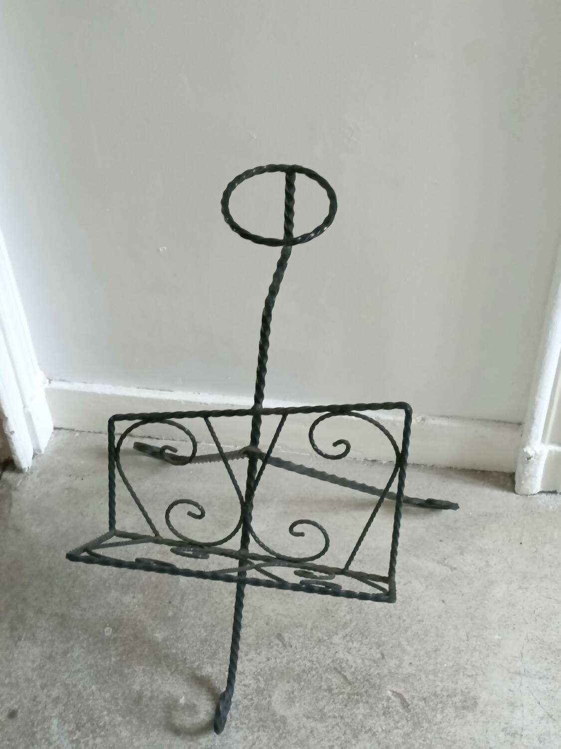 Vintage wrought iron magazine rack