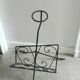 Vintage wrought iron magazine rack