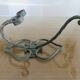 Pair of green lacquered wrought iron wall hooks, art deco, 1930s 40s