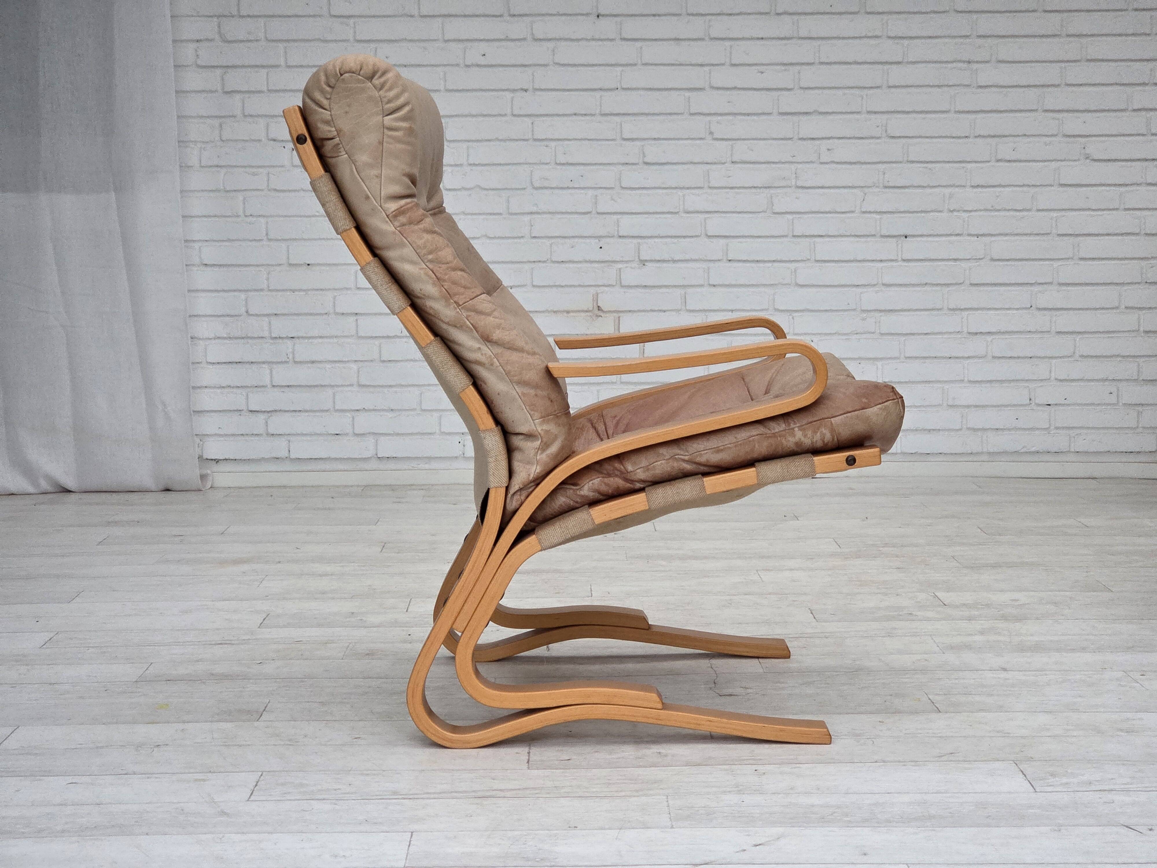 1970s, Norwegian armchair, model "Kengu", beige furniture leather.