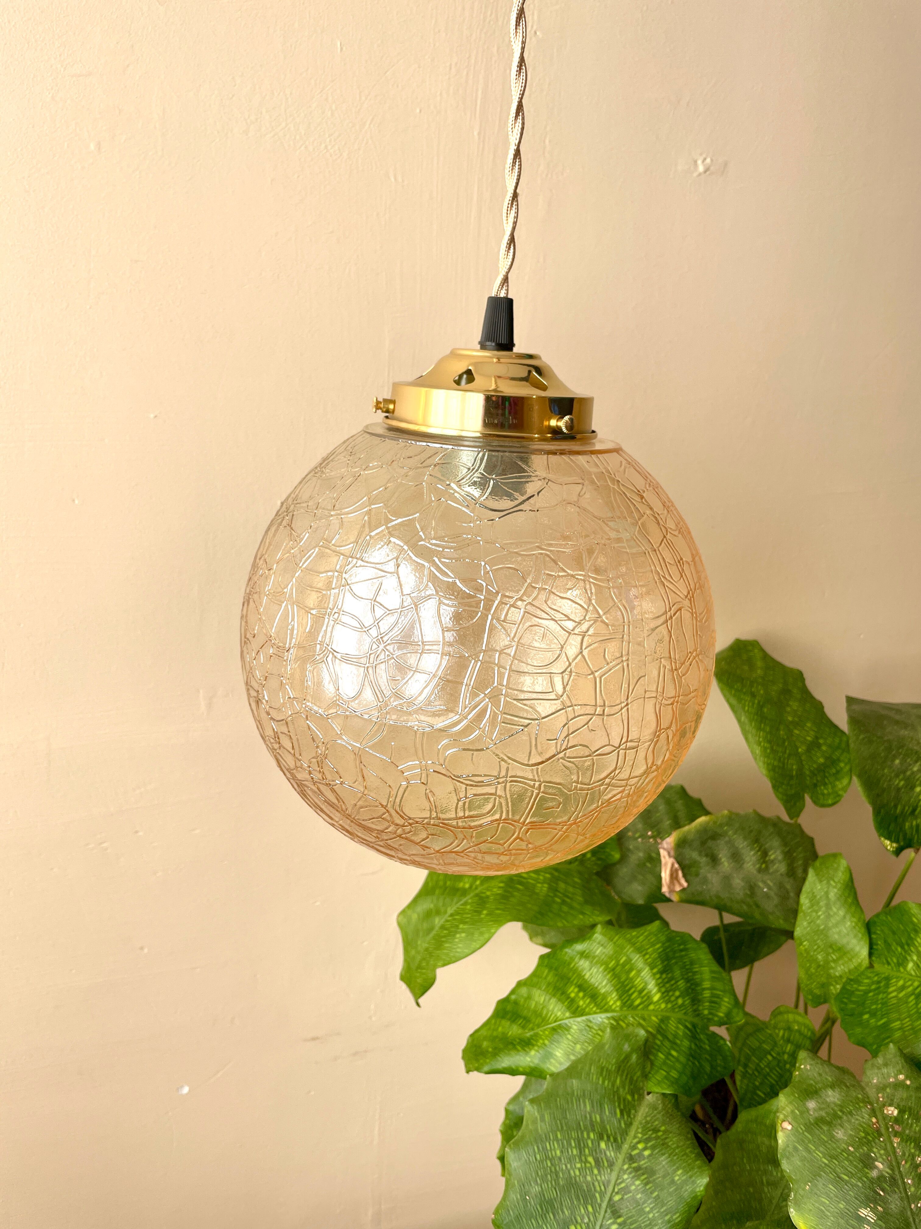 Amber glass ball suspension