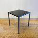 Black coffee table in raw steel Domino model Caravane brand