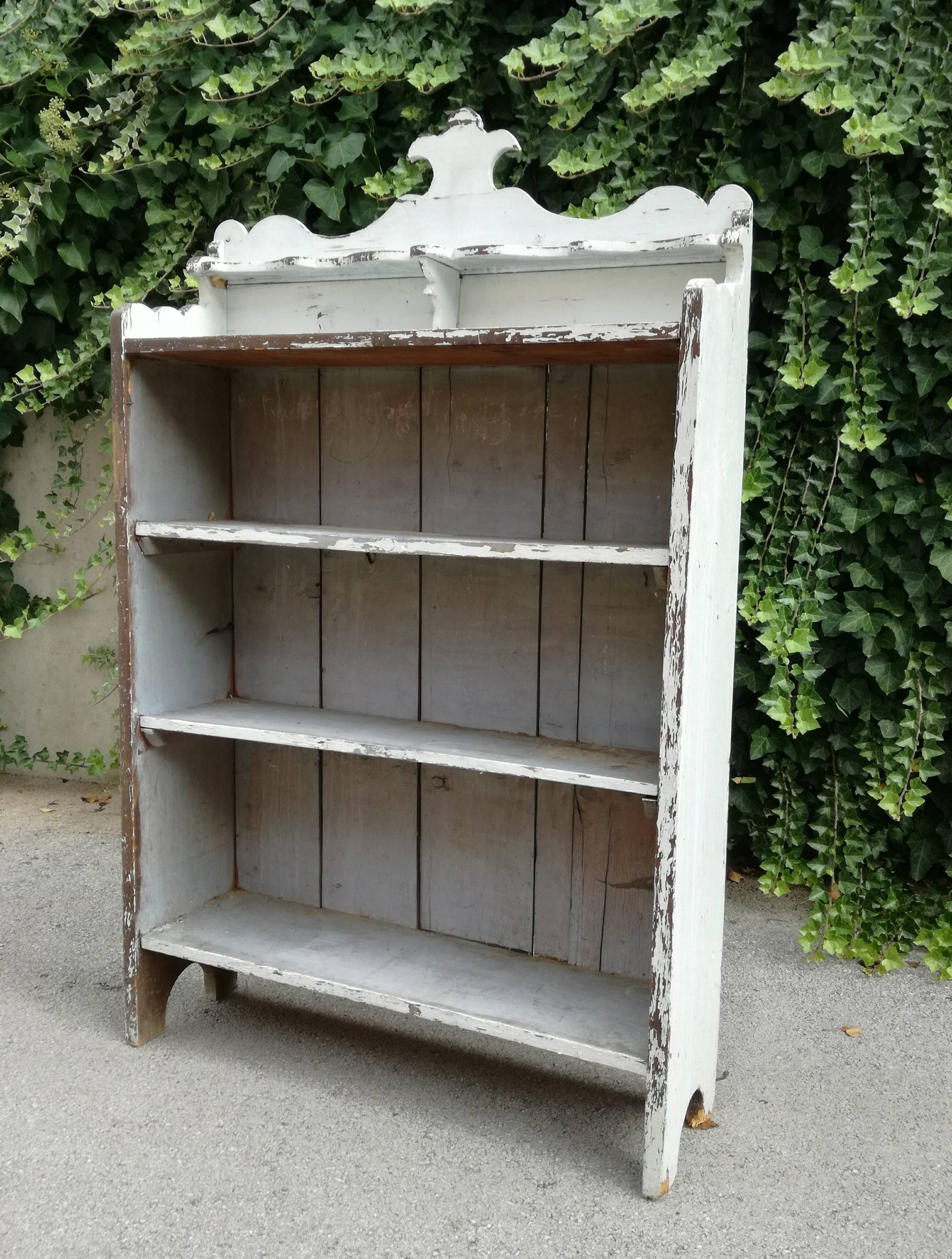 Old white shelf in weathered pine