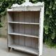 Old white shelf in weathered pine