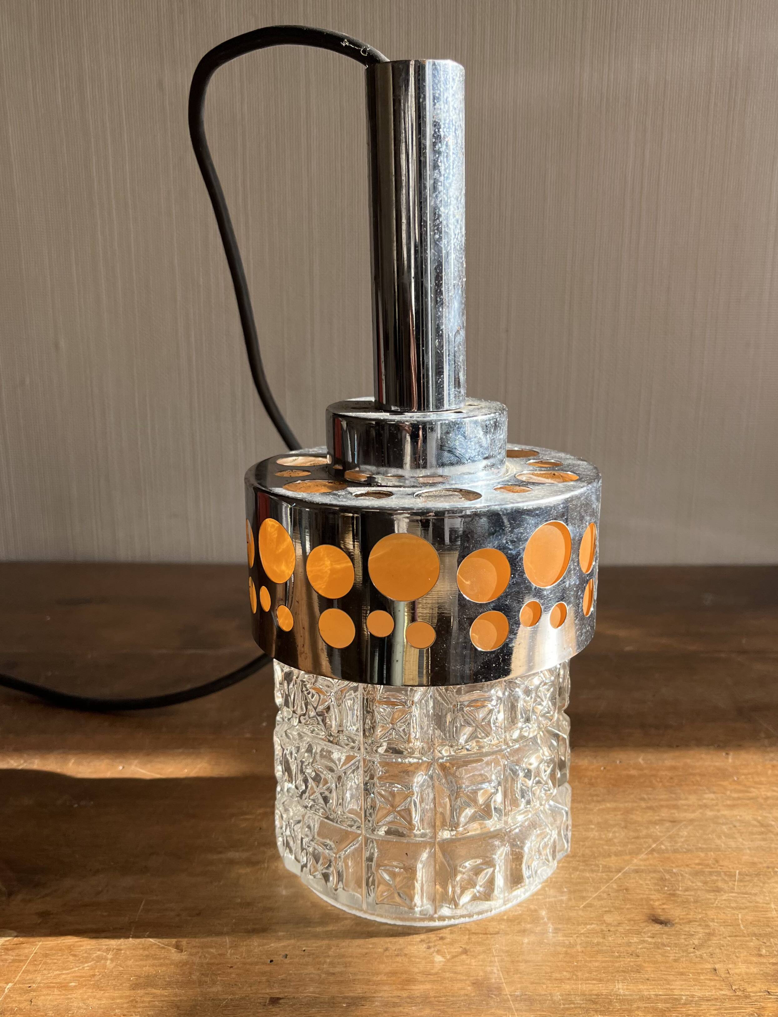 Small raak chrome and orange pendant light