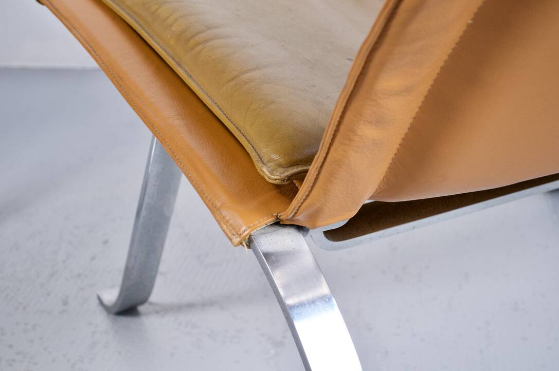 Imposing pair of leather and steel armchairs from the 1960s
