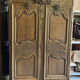 19th-century Norman wedding armoire, with bouquets of flowers and doves.