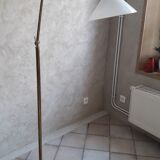 Articulated brass floor lamp