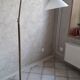 Articulated brass floor lamp