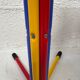 Children's coat rack in multi-colored metal