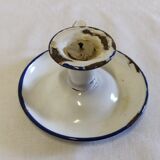 Cellar rat in old enamelled sheet metal