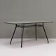 Table à manger italienne avec base en métal et plateau en verre et laiton, années 1950.