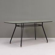 Italian dining table with metal base and glass top and brass, 1950s
