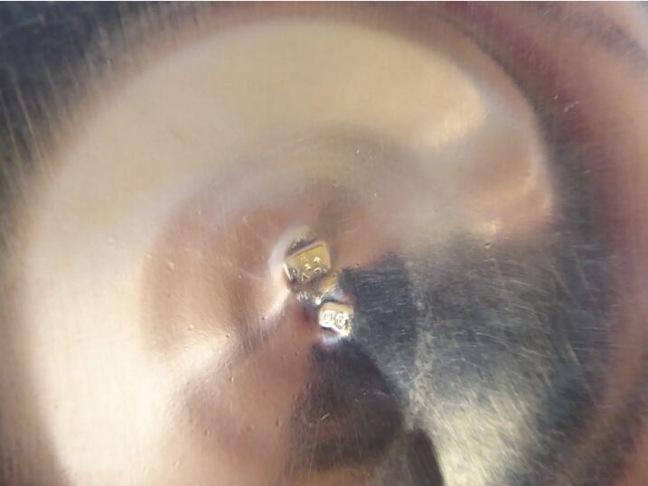 Pair of silver metal candle holders