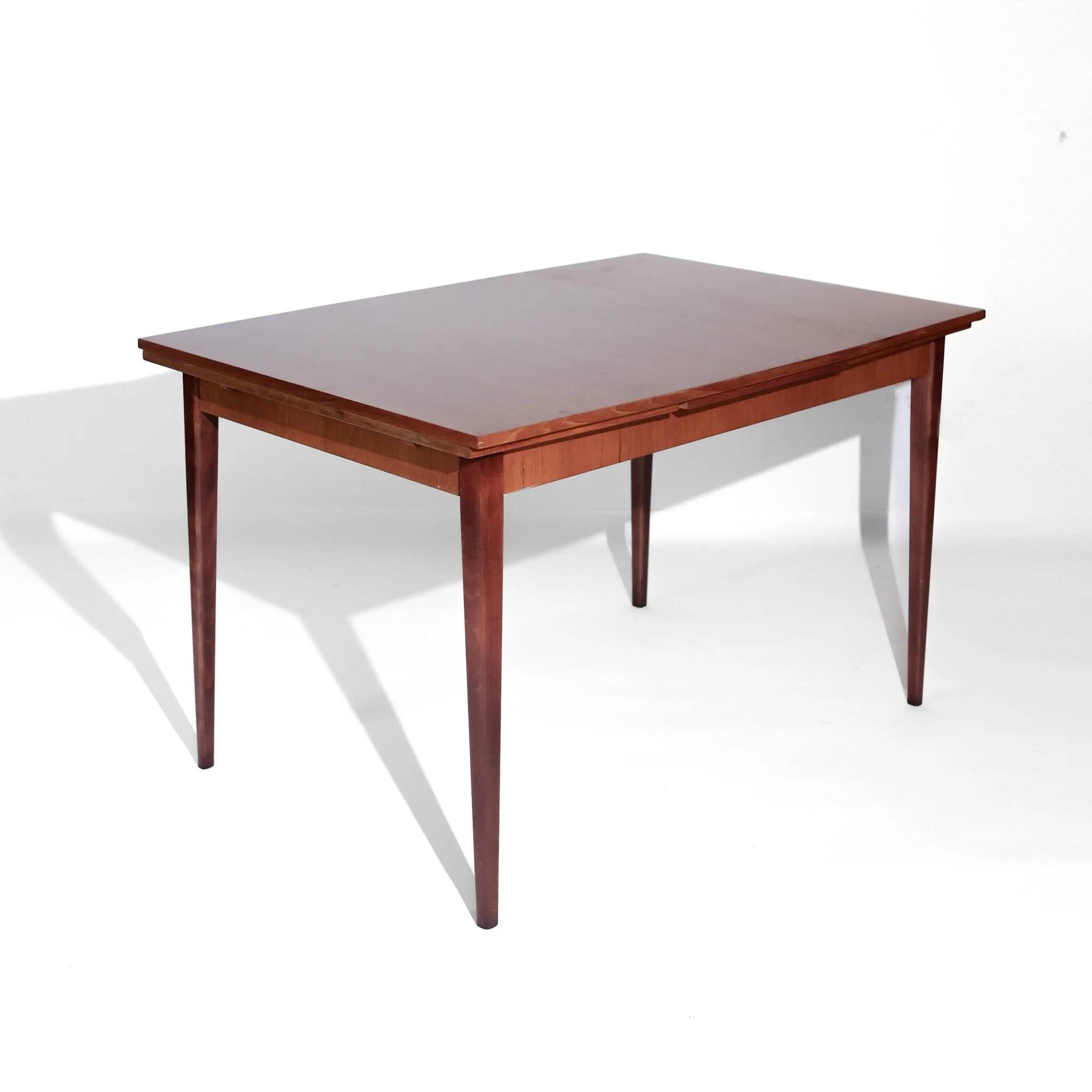 Mid-century modern Scandinavian dining table with extensions in teak, 1960s.
