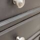 Low TV cabinet with black patina, twelve drawers and one door