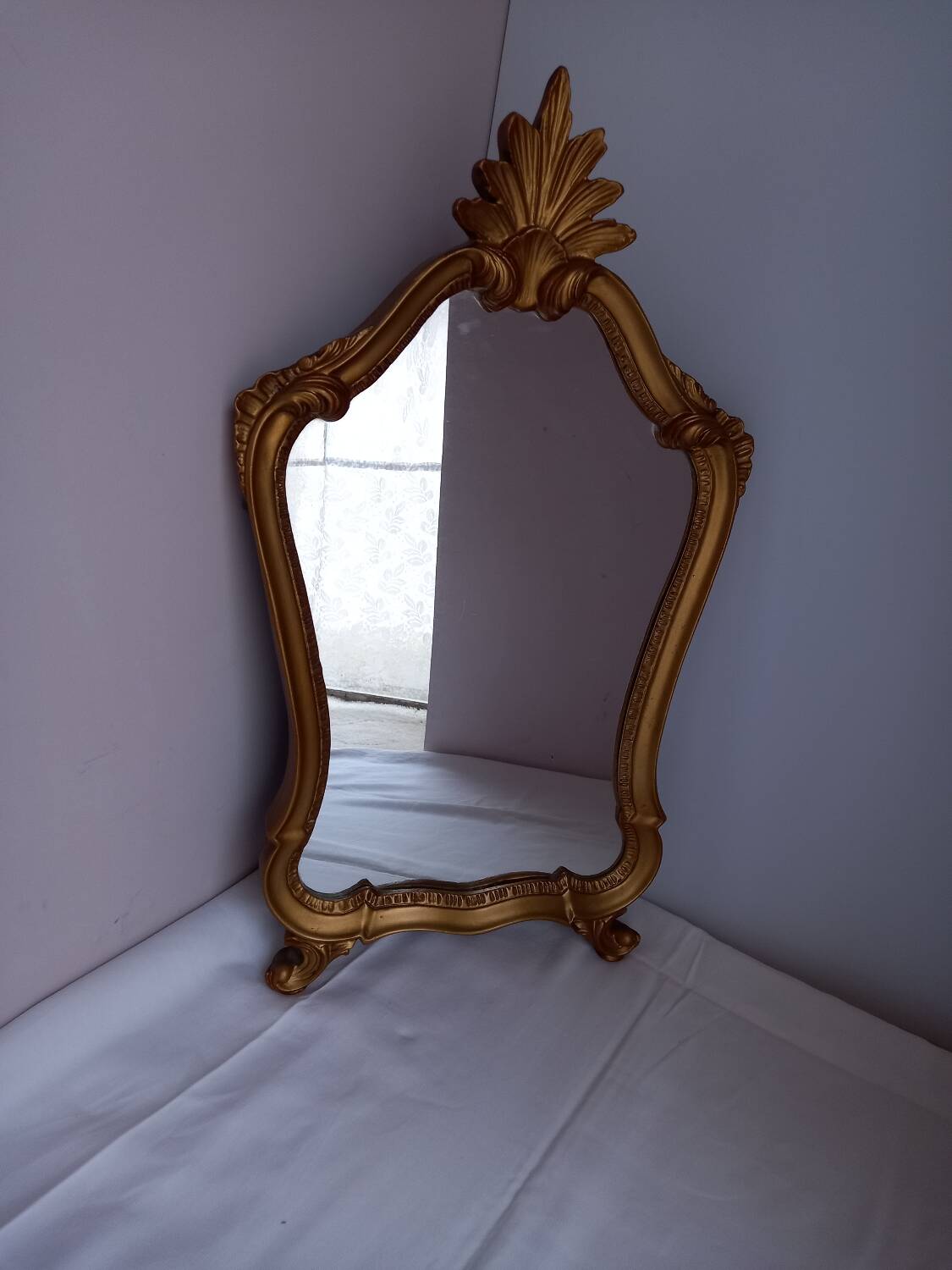 Antique gilded wooden mirror