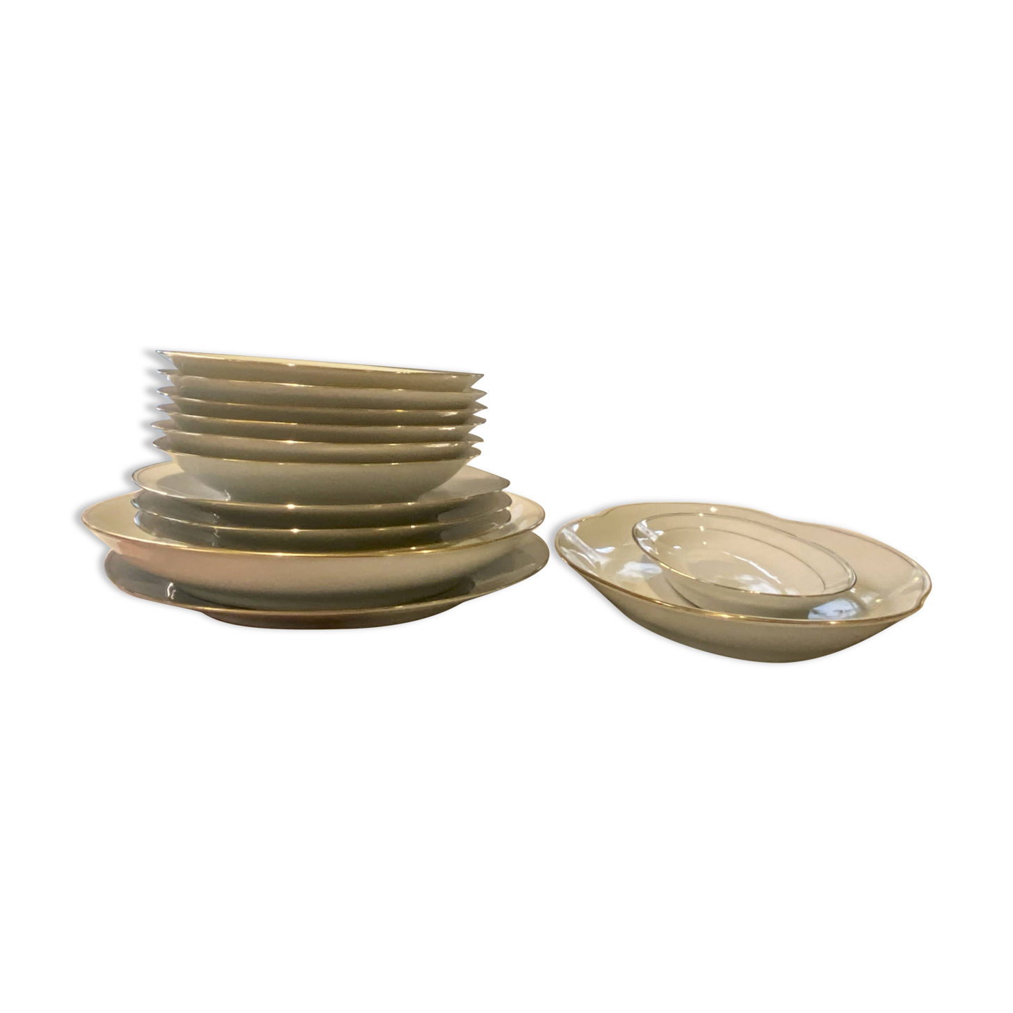 Vintage table service Limoges porcelain white with gold trim.