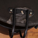 Fauteuil noir pieds en arc