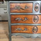 Curved patinated chest of drawers