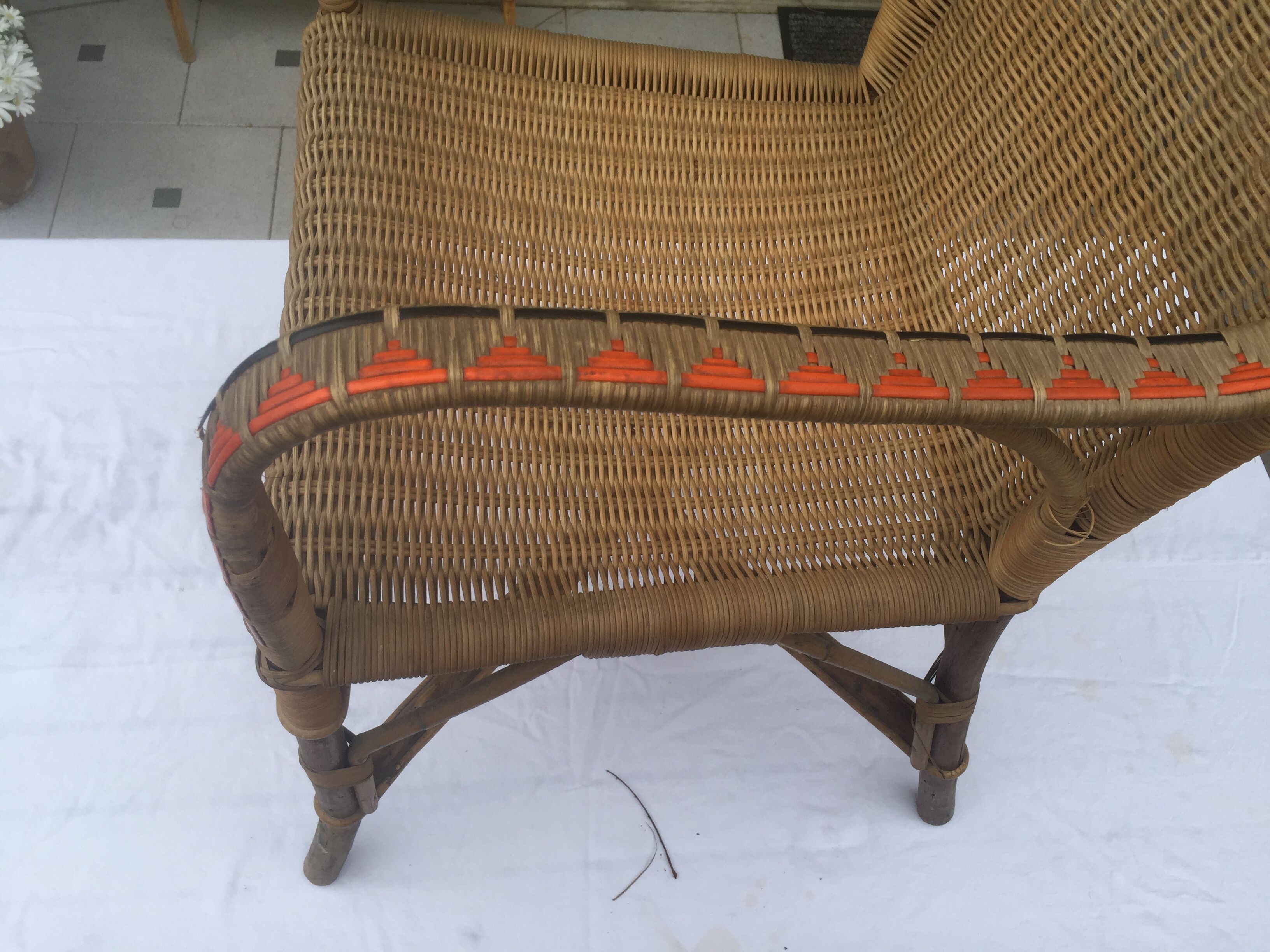 Red vintage décor rattan armchair