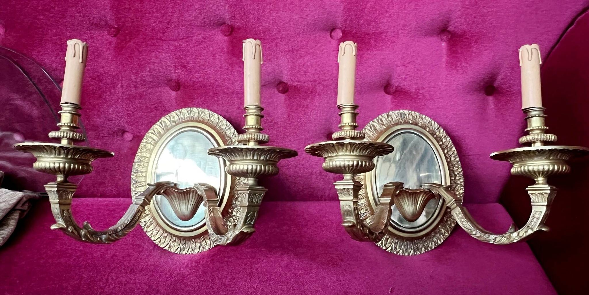 Pair of Louis XVI style solid gilded bronze wall sconces.