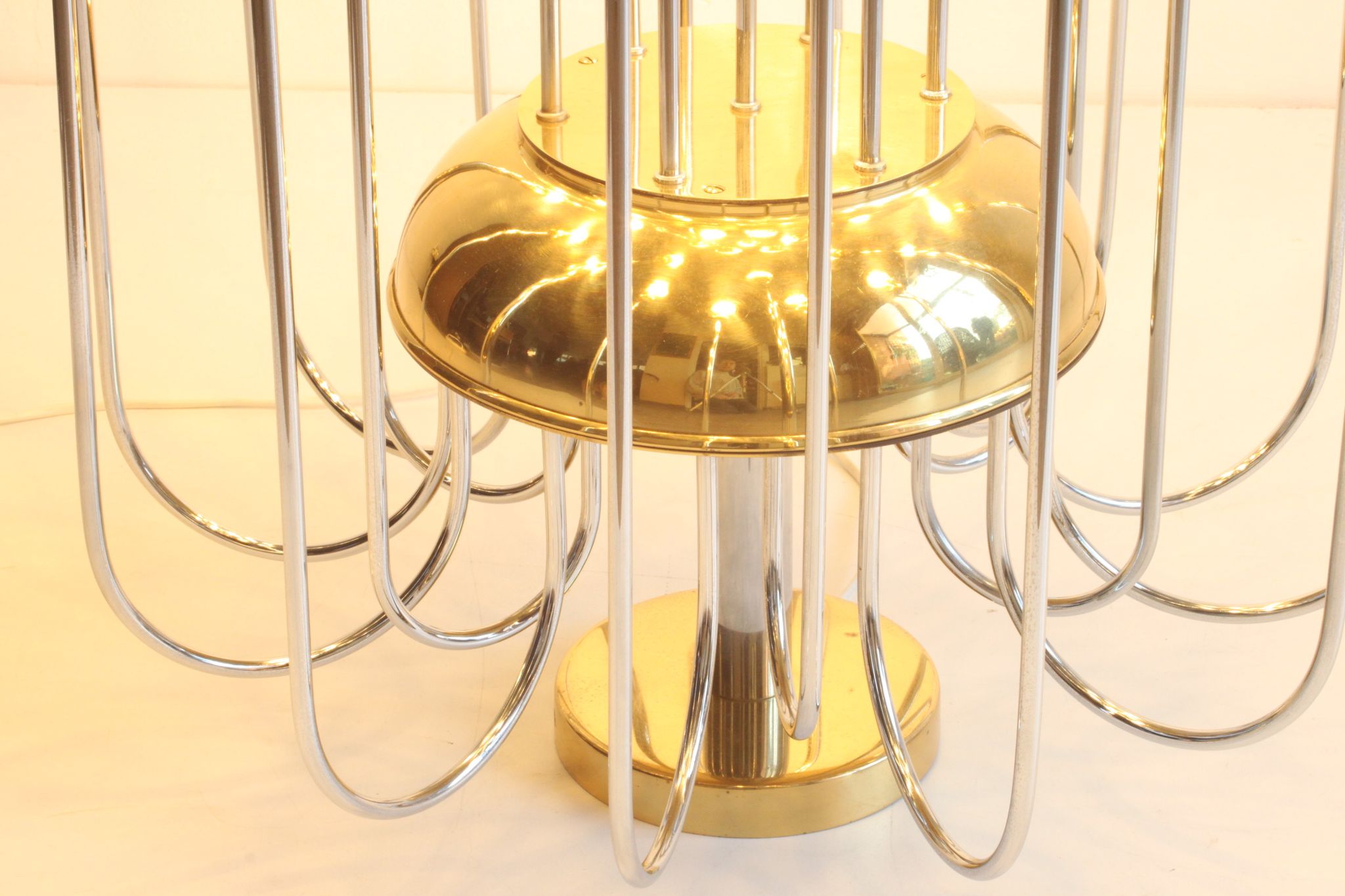 Tubular chrome and brass waterfall chandelier, Italy 1970s.