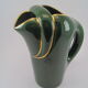 Modernist pitcher in green and gold glazed ceramic, brand MAGDALITHE MADE IN FRANCE around 1950 1