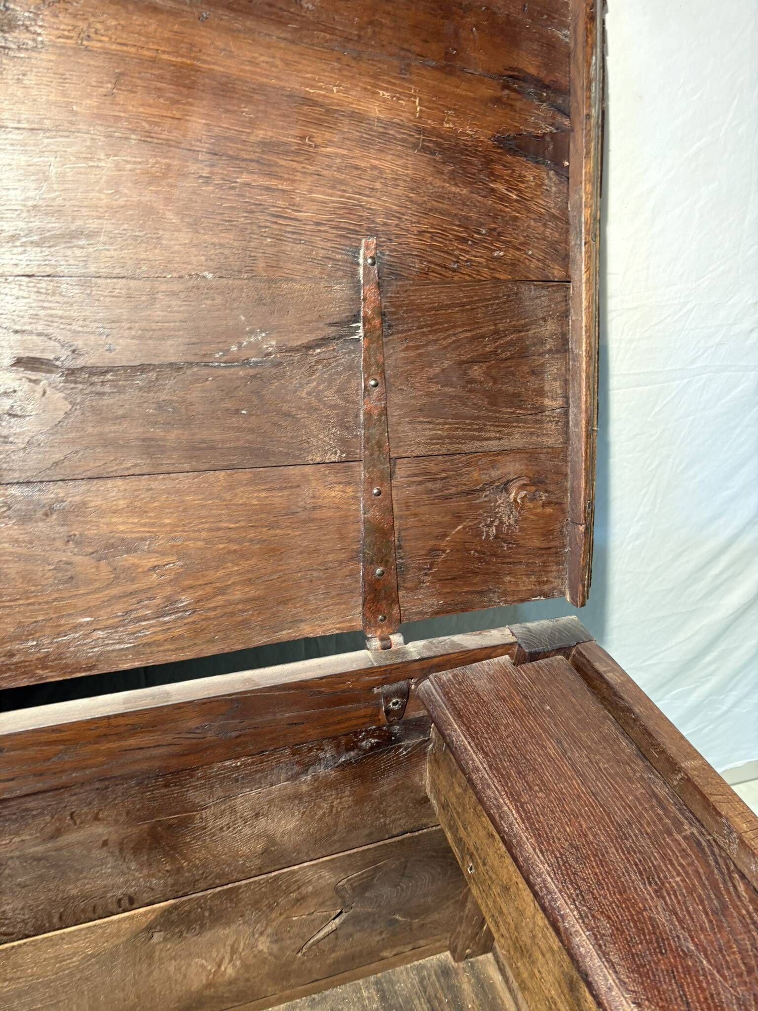 Rustic antique oak chest, original fittings and moulded panels.