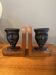 Pair of bronze mask bookends