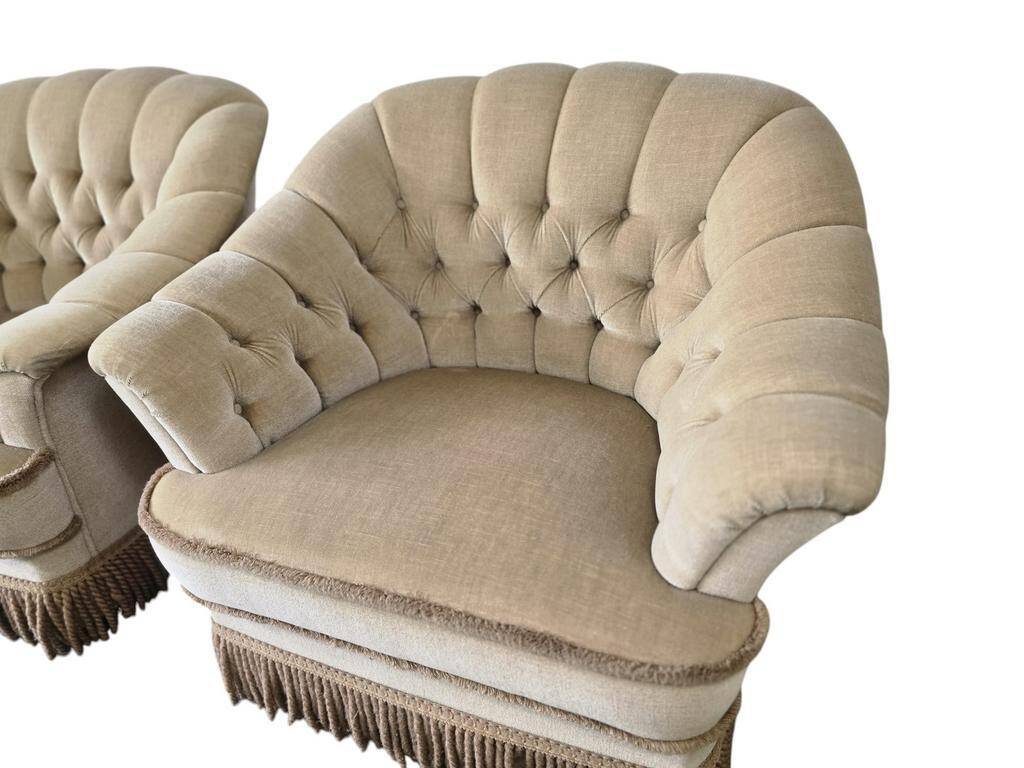 Set of 2 vintage ecru armchairs with fringes.