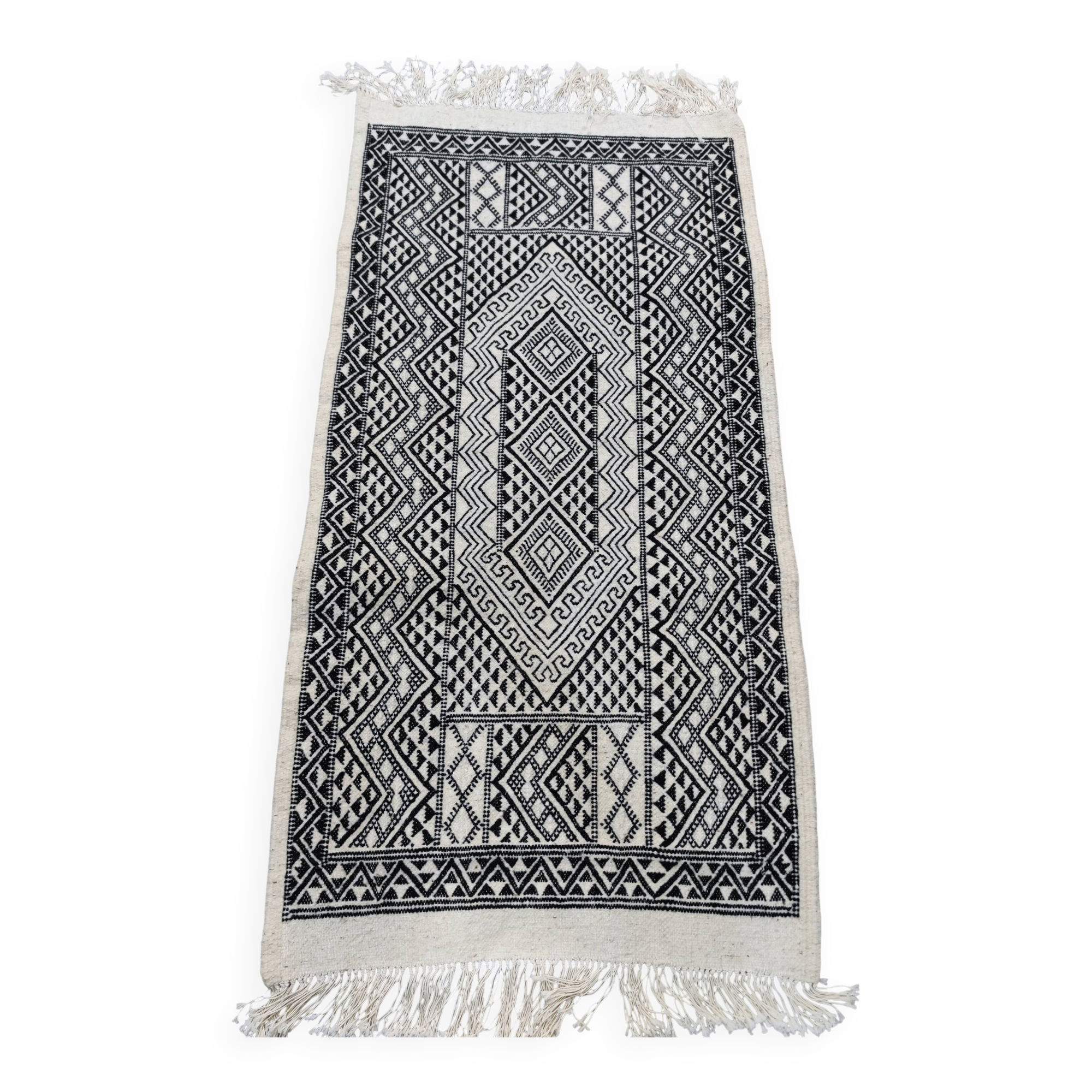 Handwoven black and white rug