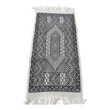 Handwoven black and white rug